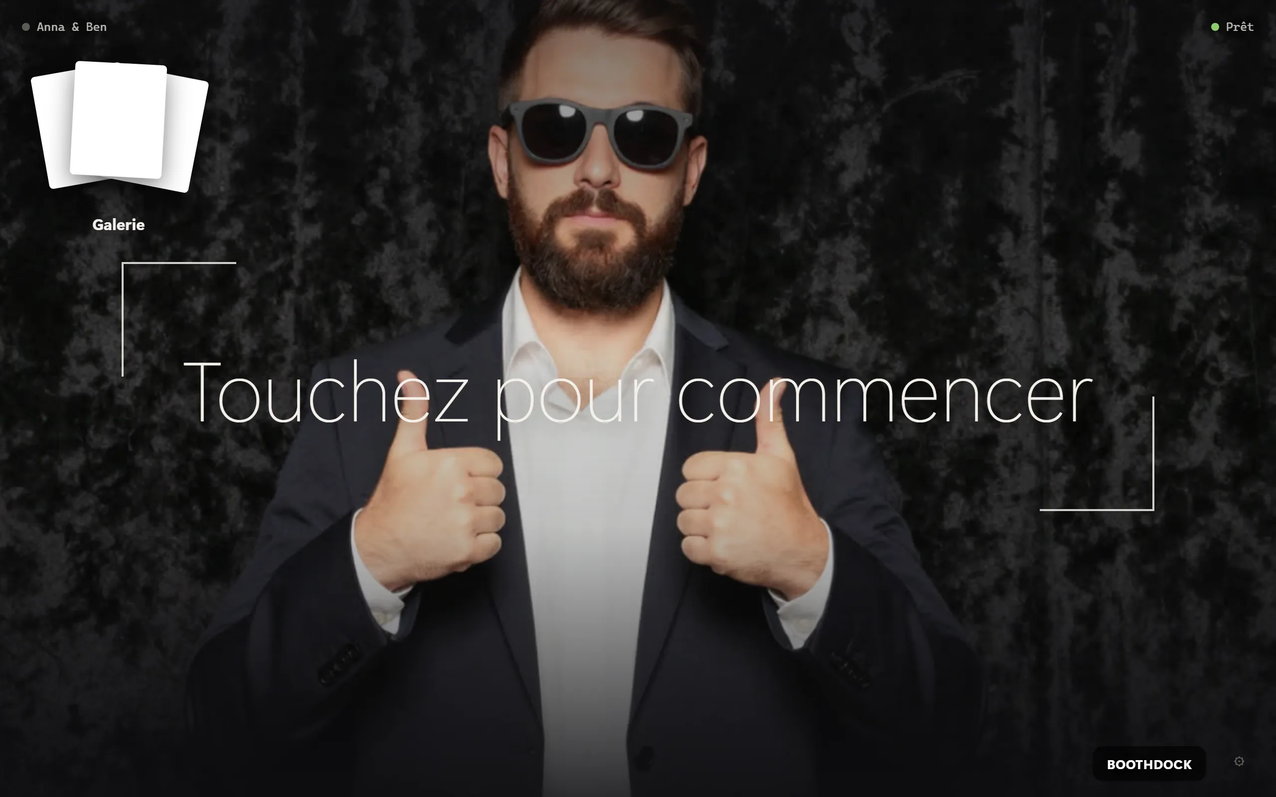 Le kiosque invité à la Box : « Touchez pour commencer » avec aperçu en direct